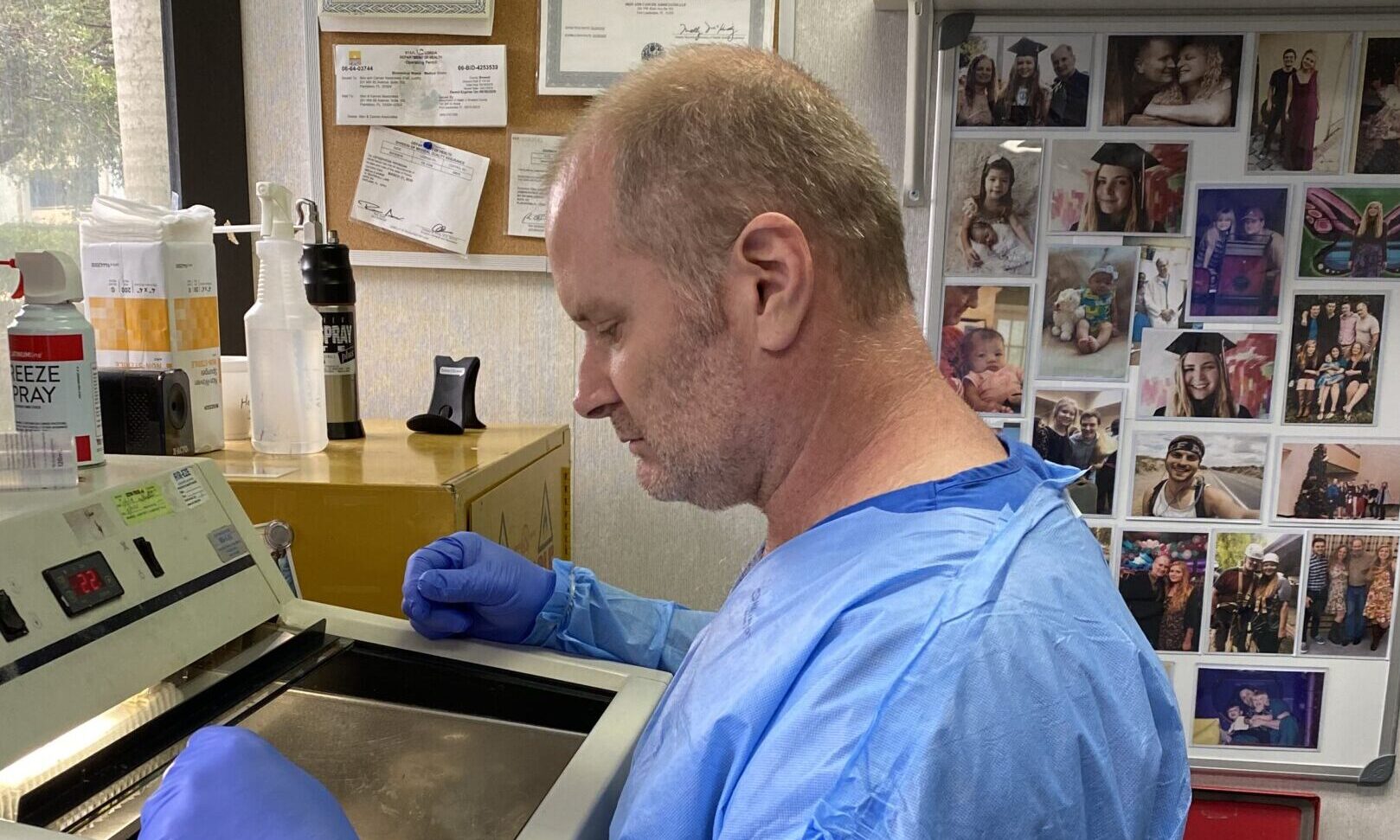 man sitting at cryostat